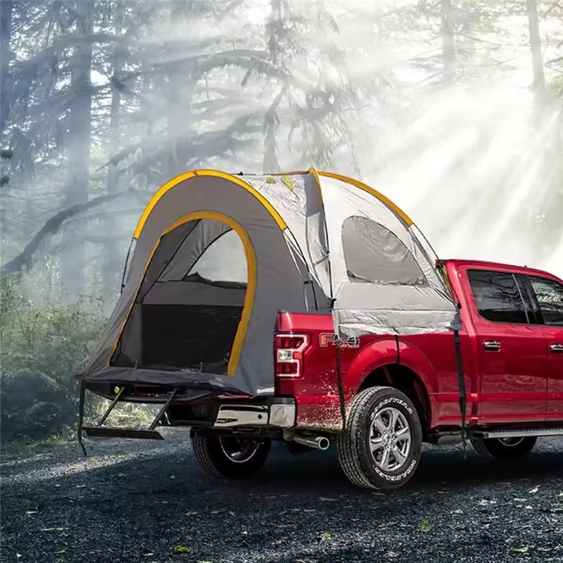 a red truck in a forest